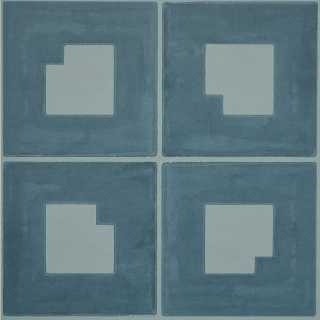 Palindrome wallpaper in teal by Schumacher, featuring a large-scale geometric grid pattern with a hand-painted effect.