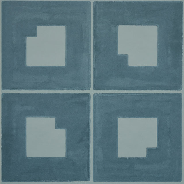 Palindrome wallpaper in teal by Schumacher, featuring a large-scale geometric grid pattern with a hand-painted effect.