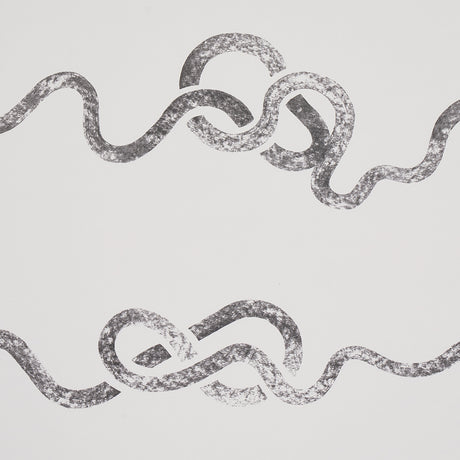 Rhapsody Graphite by Schumacher - Large-scale calligraphic stripe wallpaper in graphite on white, shown in a bedroom setting.