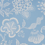 Hothouse Flowers Silhouette wallpaper in Bliss Blue by Celerie Kemble for Schumacher, large-scale white floral pattern on blue background.