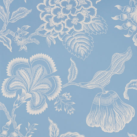 Hothouse Flowers Silhouette wallpaper in Bliss Blue by Celerie Kemble for Schumacher, large-scale white floral pattern on blue background.