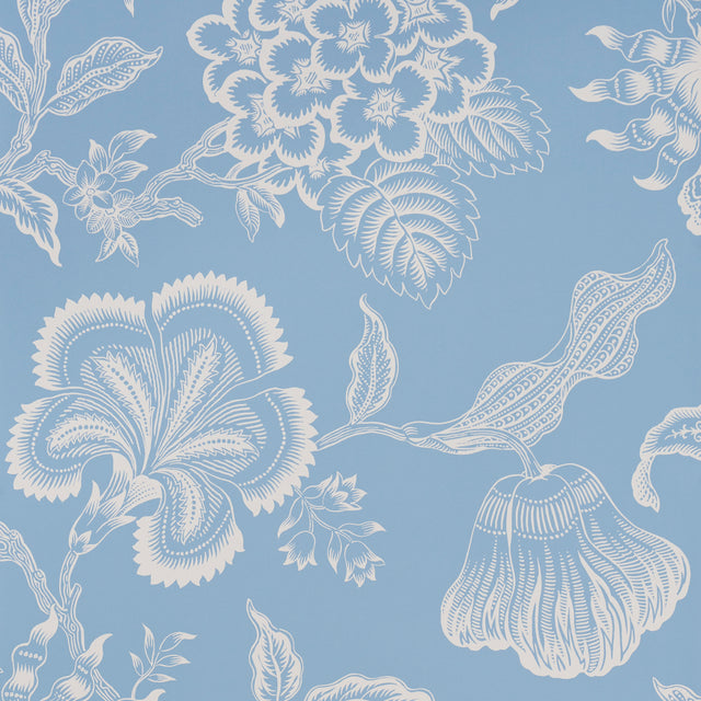 Hothouse Flowers Silhouette wallpaper in Bliss Blue by Celerie Kemble for Schumacher, large-scale white floral pattern on blue background.