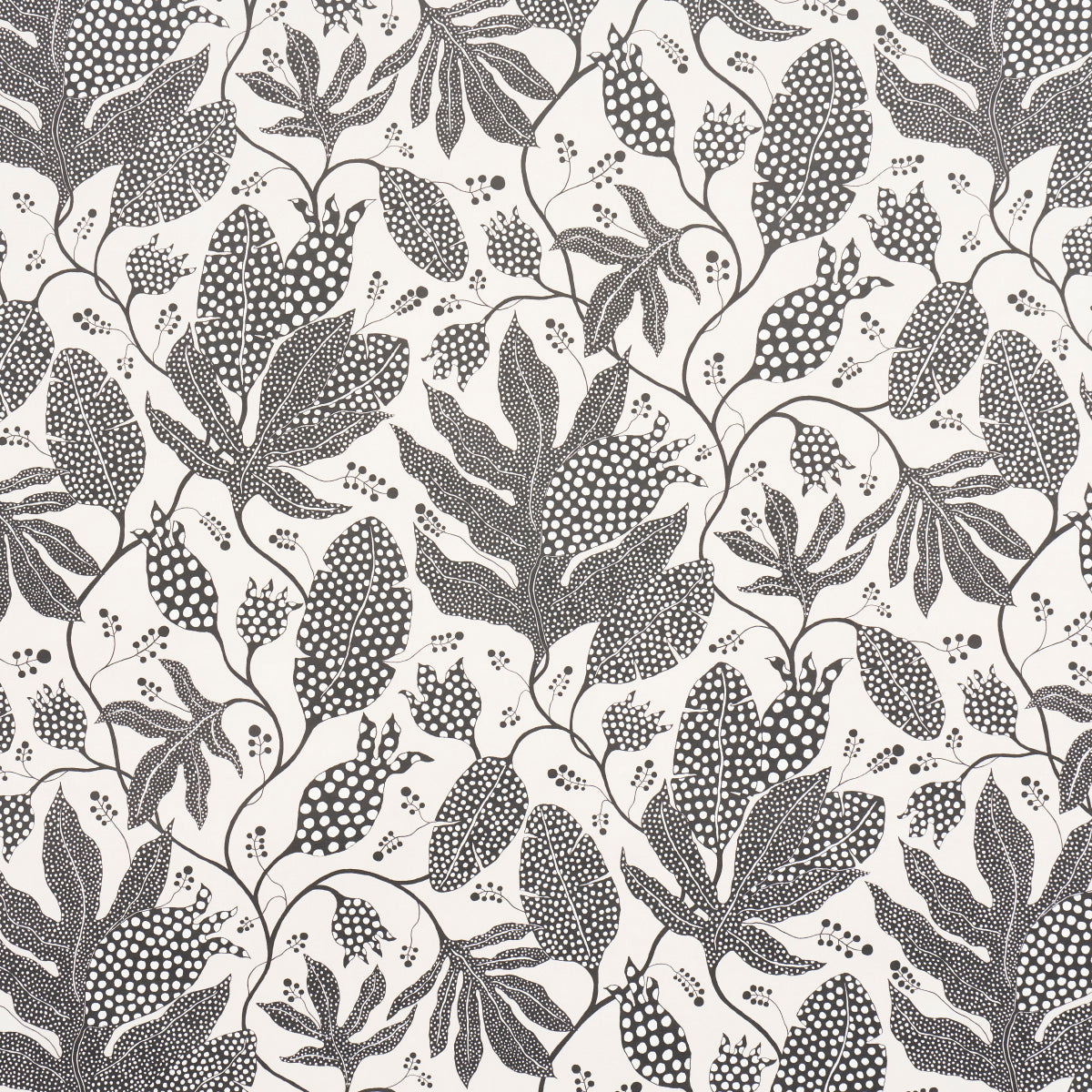 Polka Dot Jungle wallpaper by Marian McEvoy for Schumacher in black and cream, featuring a large-scale botanical and polka dot pattern.