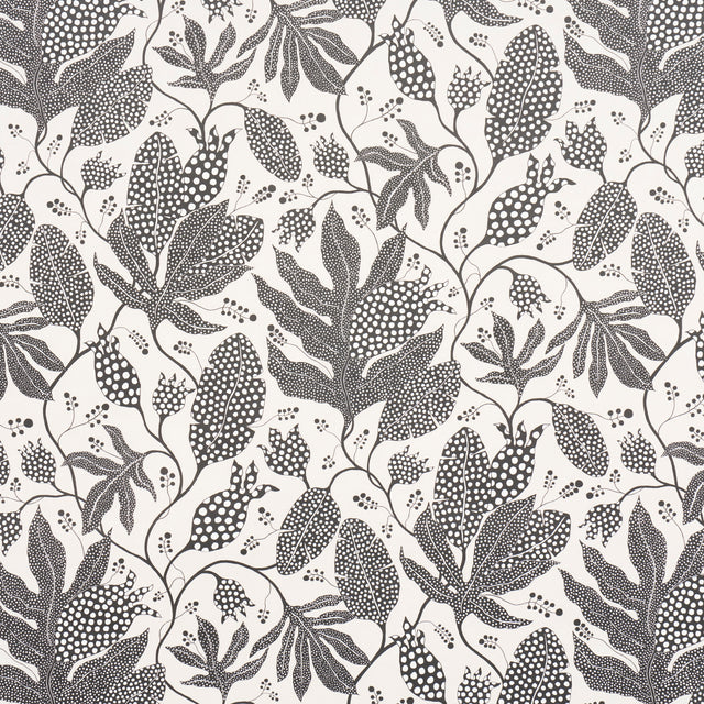Polka Dot Jungle wallpaper by Marian McEvoy for Schumacher in black and cream, featuring a large-scale botanical and polka dot pattern.