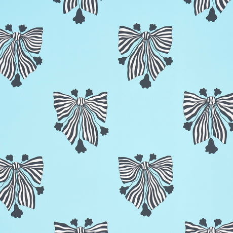 Bow-Wow-Wow wallpaper in Aqua by Schumacher, featuring bold black and white bow motifs on a light blue background.