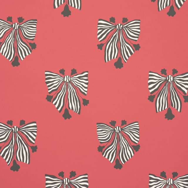 Bow-Wow-Wow wallpaper in red by Schumacher, featuring bold black and white striped bows on a vibrant red background.