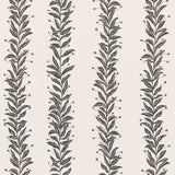 Tendril Stripe wallpaper by Marian McEvoy for Schumacher in black and cream, featuring a graceful vine pattern on a flat paper ground.
