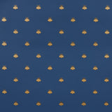 Hubert's Bees wallpaper in Midnight & Gold by Schumacher, featuring a small-scale gold bee motif on a deep blue background.