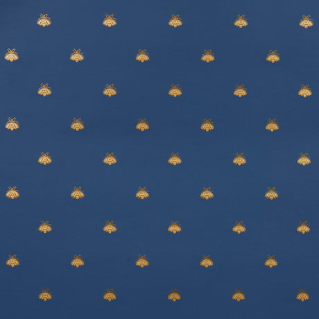 Hubert's Bees wallpaper in Midnight & Gold by Schumacher, featuring a small-scale gold bee motif on a deep blue background.