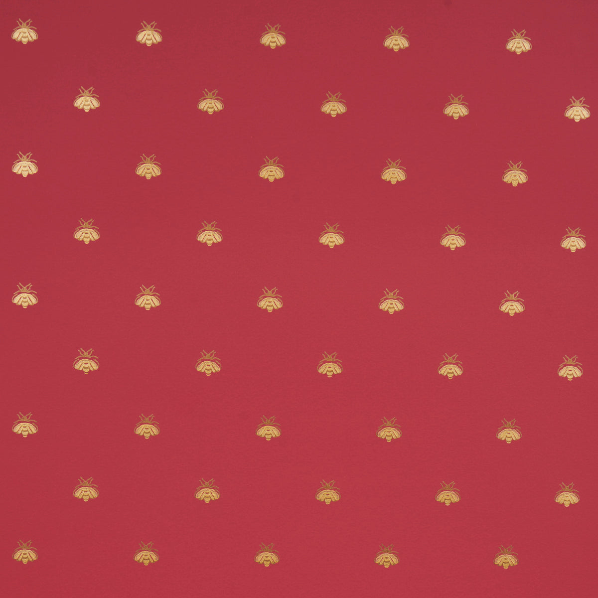 Hubert's Bees Rouge & Gold wallpaper by Schumacher featuring a small-scale gold bee motif on a rich red background.