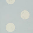 Monte Carlo Soft Blue by Backdrop, a wide-width wallpaper with large-scale random polka-dot pattern in soft blue and white.