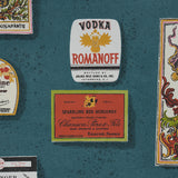 SALUD Grotto Blue by Backdrop Retro Liquor Label Wallpaper – Schumacher 5015600