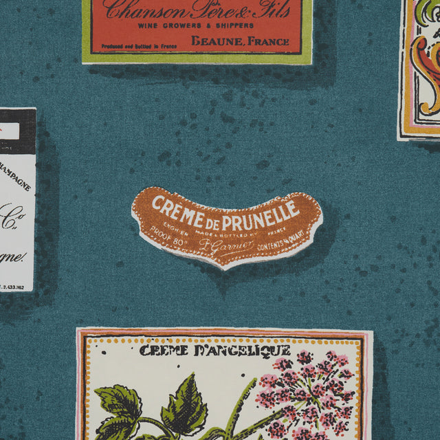 SALUD Grotto Blue by Backdrop Retro Liquor Label Wallpaper – Schumacher 5015600