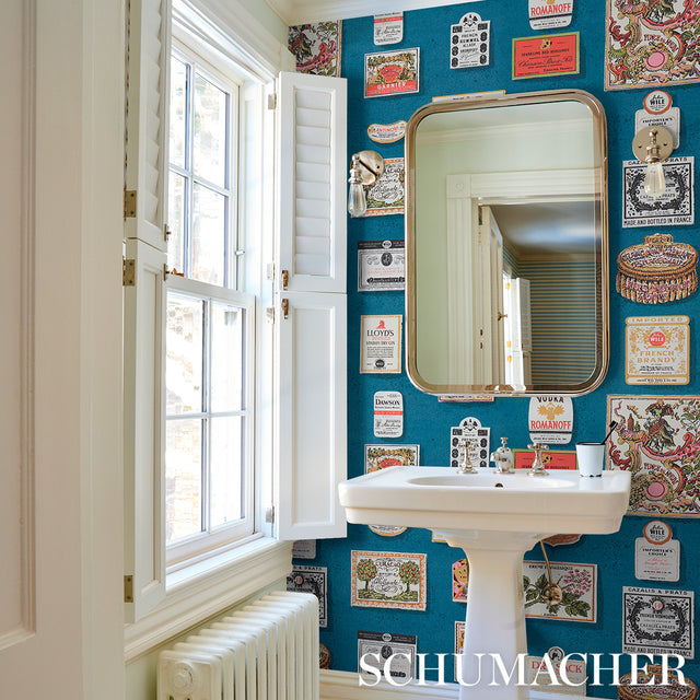 SALUD Grotto Blue by Backdrop Retro Liquor Label Wallpaper – Schumacher 5015600