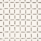 Drifting Grid wallpaper in black by Caroline Z Hurley for Schumacher, featuring a playful hand-drawn grid pattern.