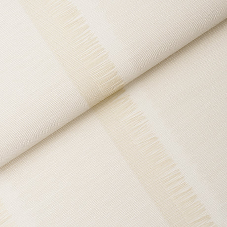Axel Fringe Wallcovering in Parchment by Schumacher, a large-scale vertical stripe wallpaper with fringe detail and textured finish.