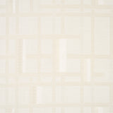 Axel Plaid Wallcovering in Parchment by Schumacher. Artisanal geometric jacquard weave wallpaper with cut fringe detail, shown in a styled bedroom interior.