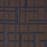 AXEL PLAID WALLCOVERING in Navy/Espresso by Schumacher. Artisanal geometric jacquard weave wallpaper with cut fringe detail, shown in a styled bedroom.