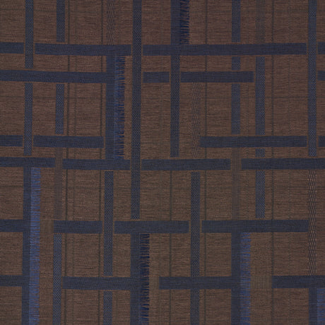 AXEL PLAID WALLCOVERING in Navy/Espresso by Schumacher. Artisanal geometric jacquard weave wallpaper with cut fringe detail, shown in a styled bedroom.
