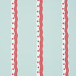 Rousseau Stripe wallpaper in Rouge & Sky by Schumacher, featuring playful wavy red and white stripes with polka dots on a pale blue background.