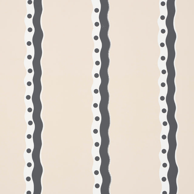 Rousseau Stripe wallpaper in Noir & Cream by Schumacher, featuring wavy black and white stripes with polka dots on a cream background.