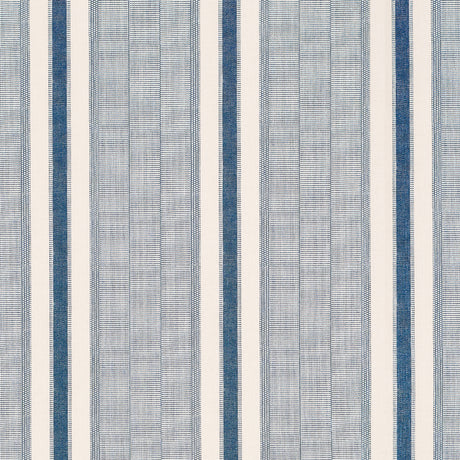 Ipala Stripe Vinyl wallpaper in Ocean by Schumacher, a blue and white multi-width stripe high-performance vinyl wallcovering designed in collaboration with A Rum Fellow.