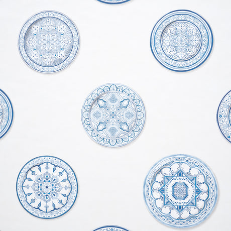 Montecito Porcelain wallpaper by Mark D. Sikes for Schumacher, featuring blue and white Iznik-inspired plate motifs on a white background.