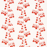 Red floral Bleeding Hearts wallpaper by Schumacher, designed by Peg Norriss, shown in a modern interior setting.