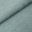 Linen Plissé Wallcovering in Adriatic Blue by Schumacher, shown in detail and installed in a bedroom setting.