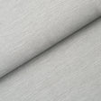 Linen Plissé Wallcovering in Mist by Schumacher, showing a close-up of the puckered linen texture and a styled room view.