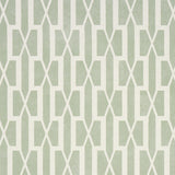 Belvedere Celadon geometric trellis wallpaper by Schumacher, designed by Veere Grenney, shown in a styled interior and close-up views.