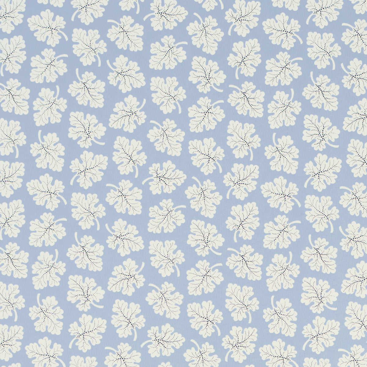 Olive Sky by Rita Konig for Schumacher - small-scale multidirectional leaf motif wallpaper in blue and white, shown in a styled bathroom interior.