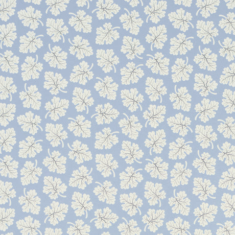Olive Sky by Rita Konig for Schumacher - small-scale multidirectional leaf motif wallpaper in blue and white, shown in a styled bathroom interior.