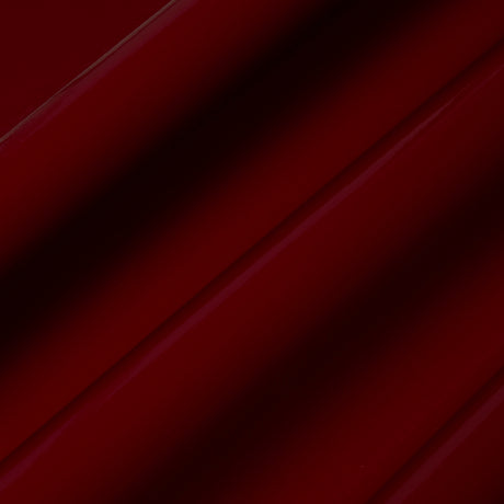 ACE FAUX LACQUER PERFORMANCE VINYL in maroon, a glossy, high-performance vinyl wallcovering by Schumacher, shown in a luxurious interior setting.