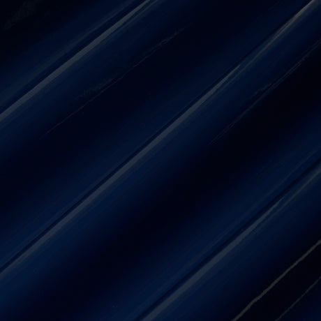 ACE FAUX LACQUER PERFORMANCE VINYL in Navy, a glossy, high-performance vinyl wallcovering by Schumacher, shown in a modern interior setting.