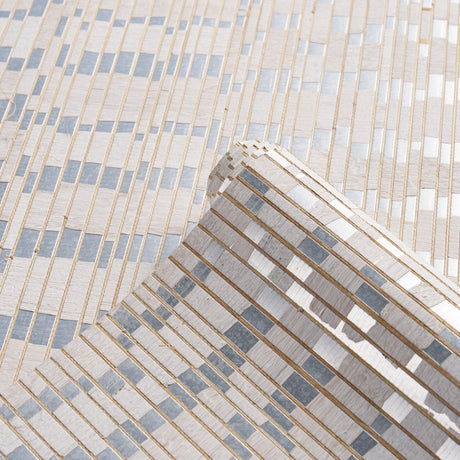 Close-up and room view of Etti Waterlily Wallcovering in silver by Schumacher, showing hand-assembled waterlily, grass, and metallic paper mosaic design.
