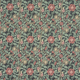 Garden Guild Midnight wallpaper by Schumacher featuring a large-scale floral botanical pattern in green, pink, and cream on a dark background.
