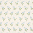 Lily of the Valley Bluebell floral wallpaper by Schumacher, classic hand-painted style with blue and green botanical pattern on cream background.