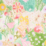 Frank's Garden wallpaper by Schumacher features a vibrant, hand-painted botanical design in pink, green, and yellow tones, inspired by Josef Frank.