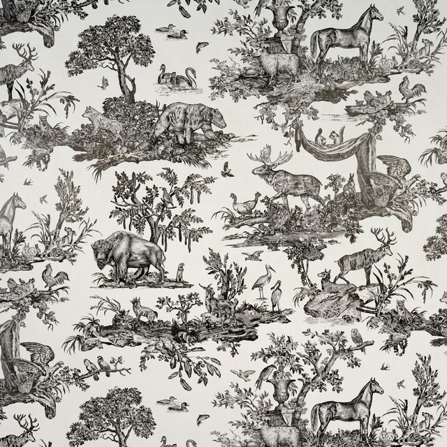 Western Toile wallpaper in Carbon by Schumacher, featuring detailed black and white etchings of North American animals and nature scenes.