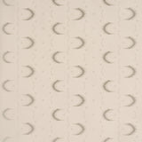 Aristelle Warm Silver abstract geometric wallpaper with ikat-inspired feathered stripe effect by Schumacher, shown in a modern bedroom setting.
