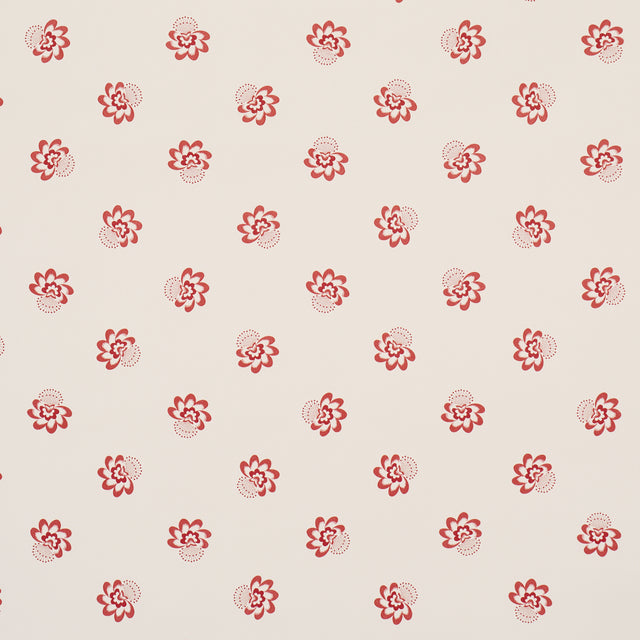 Red tossed-flower pattern wallpaper, Auclair Floral by Schumacher, shown in a styled bathroom setting.