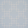 Georgette Trellis wallpaper in light blue with a geometric lattice pattern by Schumacher, shown in a styled bathroom interior.