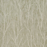 Komorebi Illuminated Forest wallpaper by Schumacher featuring a shimmering arboreal pattern in a bedroom setting.
