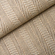 Zigzag Paperweave wallpaper in flax colorway, featuring a pronounced herringbone texture and woven pattern, styled in a modern interior setting.