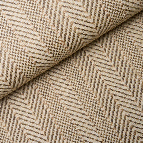 Zigzag Paperweave wallpaper in flax colorway, featuring a pronounced herringbone texture and woven pattern, styled in a modern interior setting.