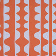 DRIFT wallpaper in Currant by Schumacher, featuring bold wavy vertical stripes in orange and white, modern geometric design.