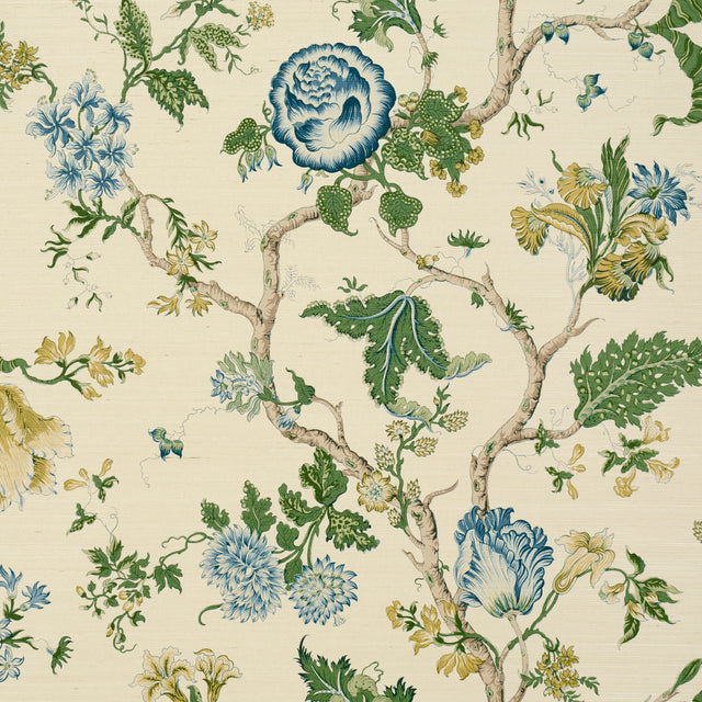 Josephine Sisal wallpaper in Peacock by Schumacher, featuring a midscale tree of life floral pattern in blue, green, and yellow on a textured sisal background.