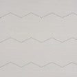 Rivet Stripe Sisal wallpaper in Dove by Schumacher, featuring a horizontal chevron stripe pattern formed by delicate dots on a textured sisal background.