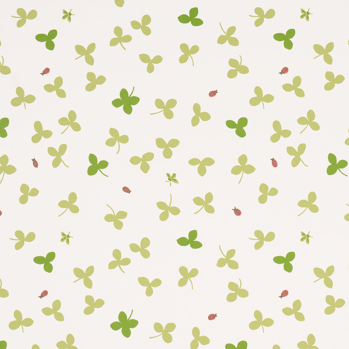 Celia Clover wallpaper by Schumacher featuring a whimsical botanical clover pattern with ladybugs and honeybees on an ivory background.